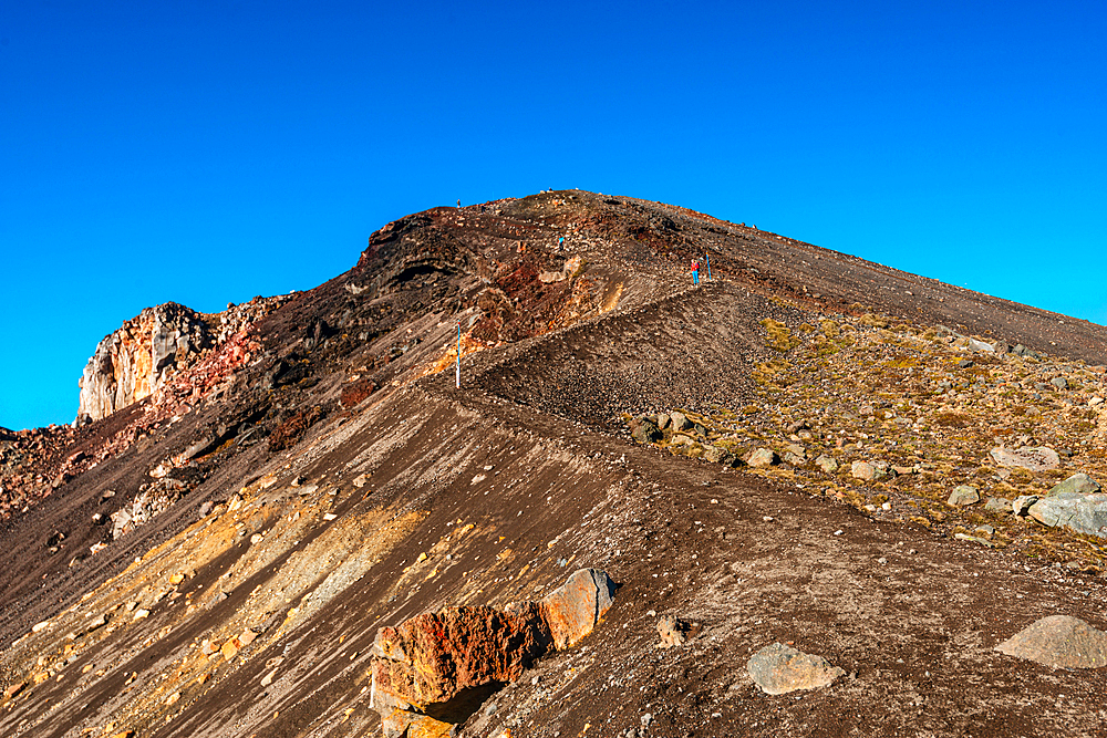 View along the slope and hiking trail up towards the Red Crater Volcano, on Tongariro Alpine Crossing, Tongariro National Park, UNESCO World Heritage Site, North Island, New Zealand, Pacific