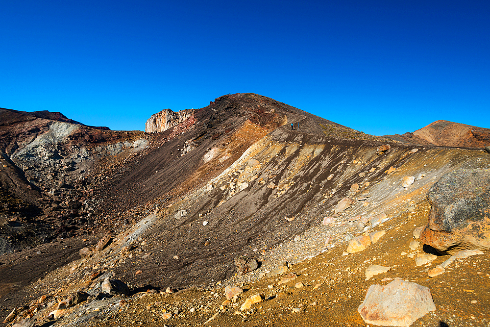 View along the slope and hiking trail up towards the Red Crater Volcano, on Tongariro Alpine Crossing, Tongariro National Park, UNESCO World Heritage Site, North Island, New Zealand, Pacific