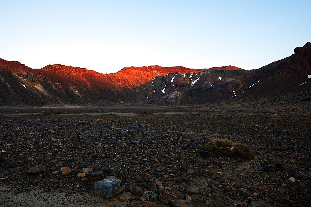 Red sunrise on the ridge of Tongariro Volcano and arid ash fields in the foreground, Tongariro National Park, UNESCO World Heritage Site, North Island, New Zealand, Pacific