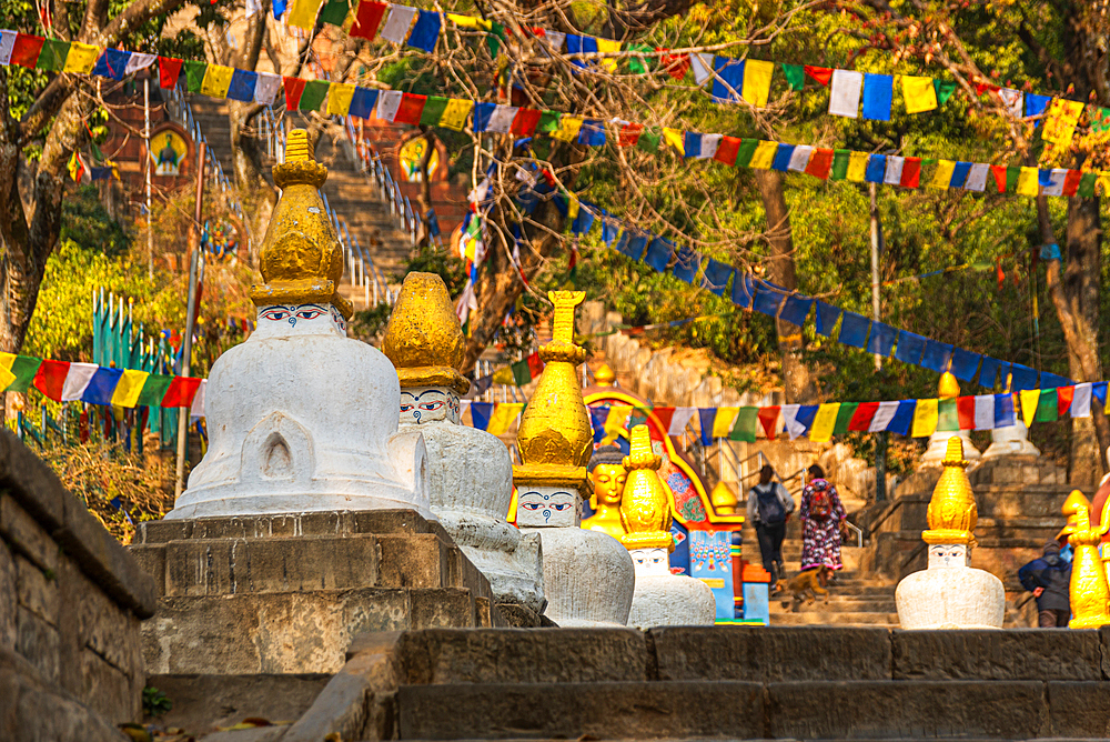 Small white stupas with face and golden top, Bhagwan Pau Swayambhu Stupa, Kathmandu, Nepal, Asia