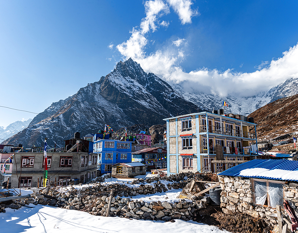 Colourful houses of Kyanjin Gompa Town with summit of Langtang Lirung above the village, Lang Tang Valley Trek, Himalayas, Nepal, Asia