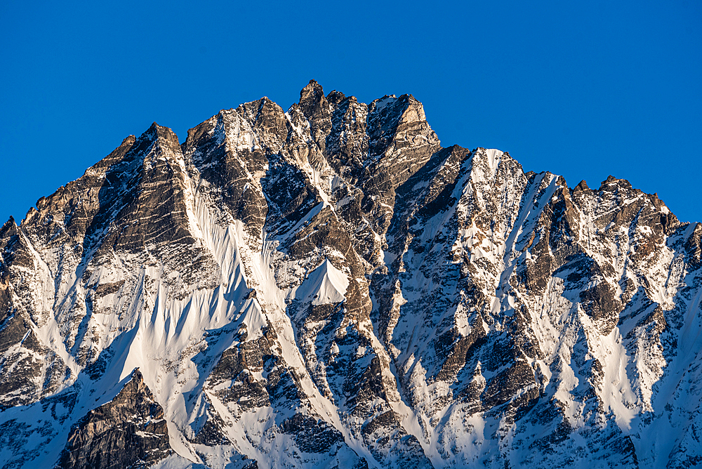 Rugged snowy mountain massif of Langtang Lirung, Lang Tang Valley Trek, Himalayas, Nepal, Asia