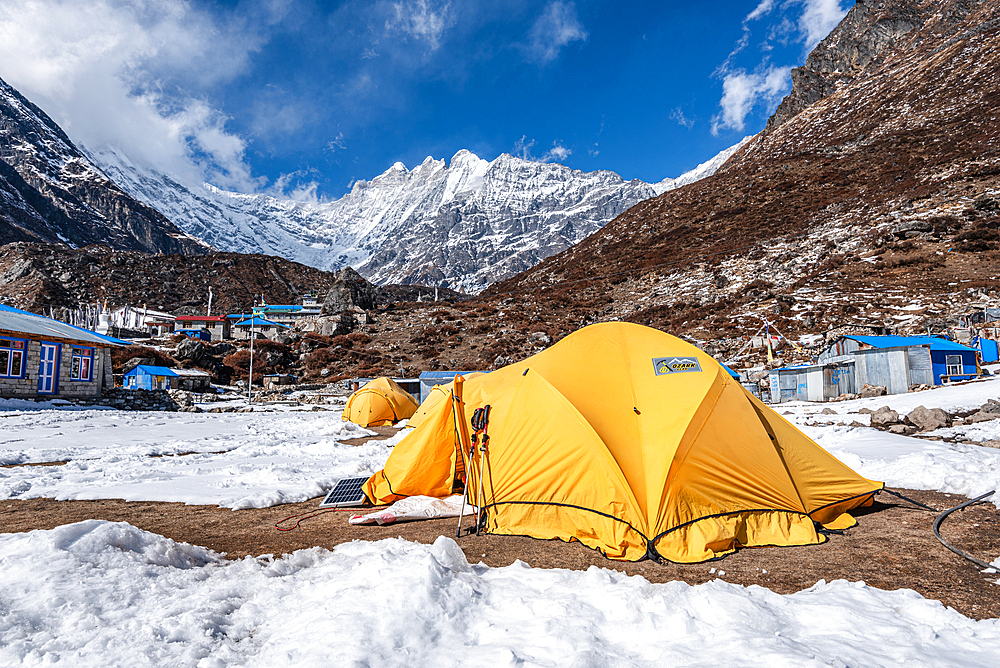 Yellow expedition tents in front of Langtan Lirung, Kyanjin Gompa, Langtang Valley trek, Himalayas, Nepal, Asia