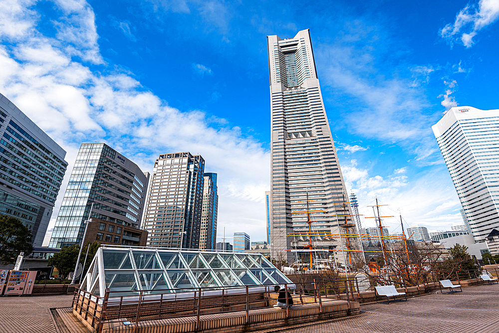 Yokohama Landmark Tower and surrounding skyscrapers against a blue sky, Yokohama, Honshu, Japan, Asia