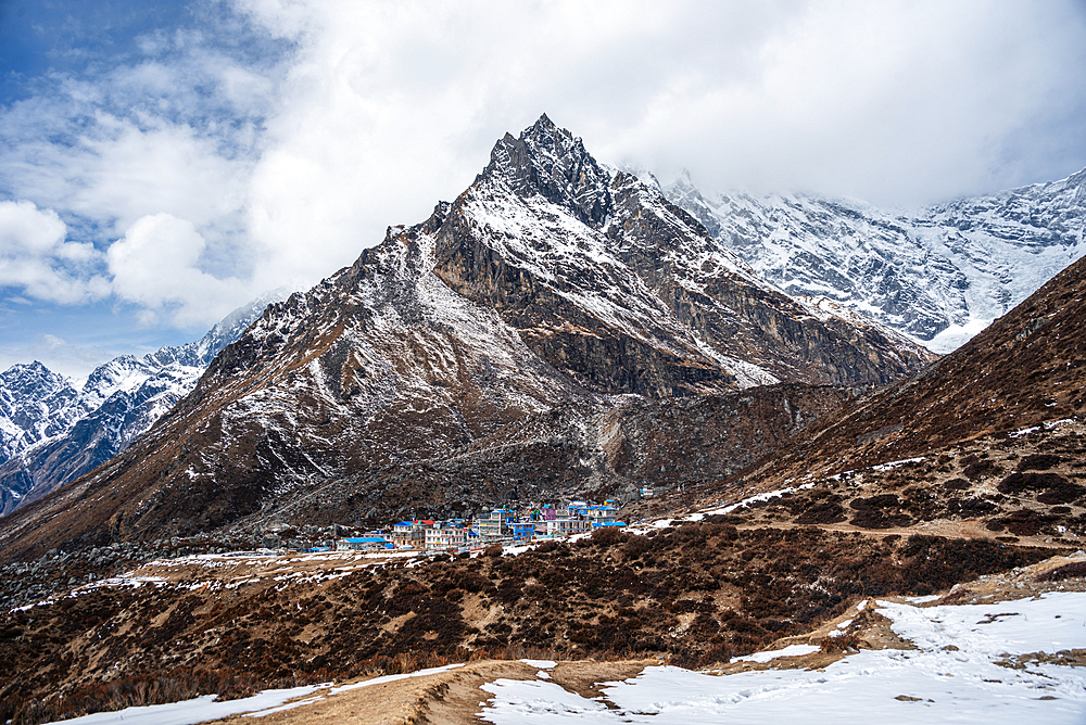 Colorful village at the foot of Langtang Lirung, high altitude mountains of Langtang Valley Trek near Kyanjin Gompa, Himalayas, Nepal, Asia