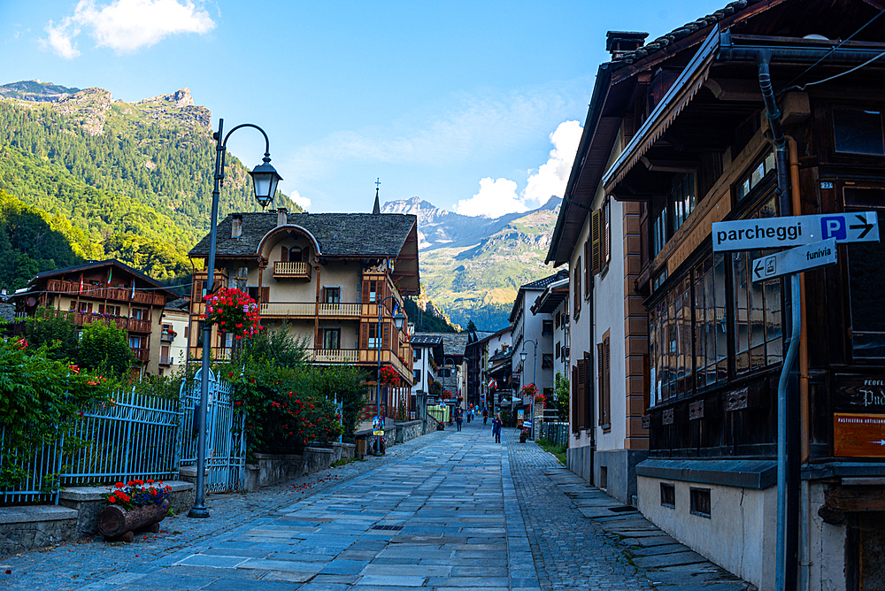 Main market road of rural Alpine village with traditional architecture, Alagna Valsesia, UNESCO World Heritage Site, Vercelli Province, Piedmont, Italian Alps, Italy, Europe