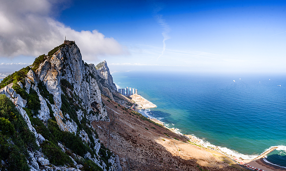 Impressive panoramic view over the Rock of Gibraltar and the peninsula. Lookin down on the white cliffs onto the mediterranean renia sea and mainland Spain