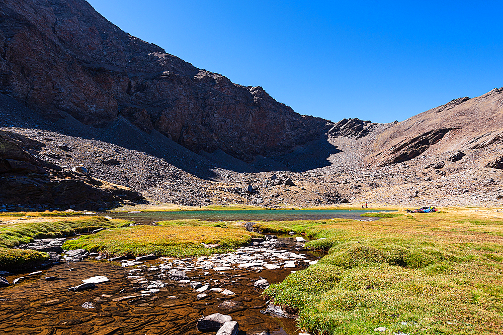 Mountain lake, Laguna Larga, at the foot of Mulhacen, Spain's highest mountain in the Sierra Nevada, Andalusia, Spain, Europe