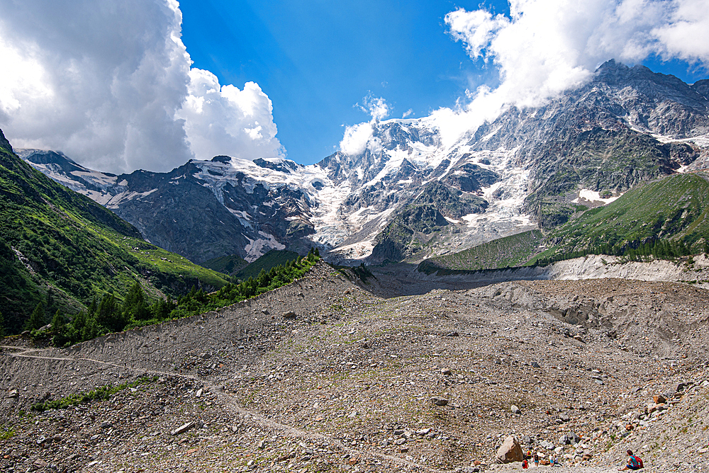 Hiking trail in alpine landscape facing Monte Rosa with moraine landscape, Italian Alps, Italy, Europe