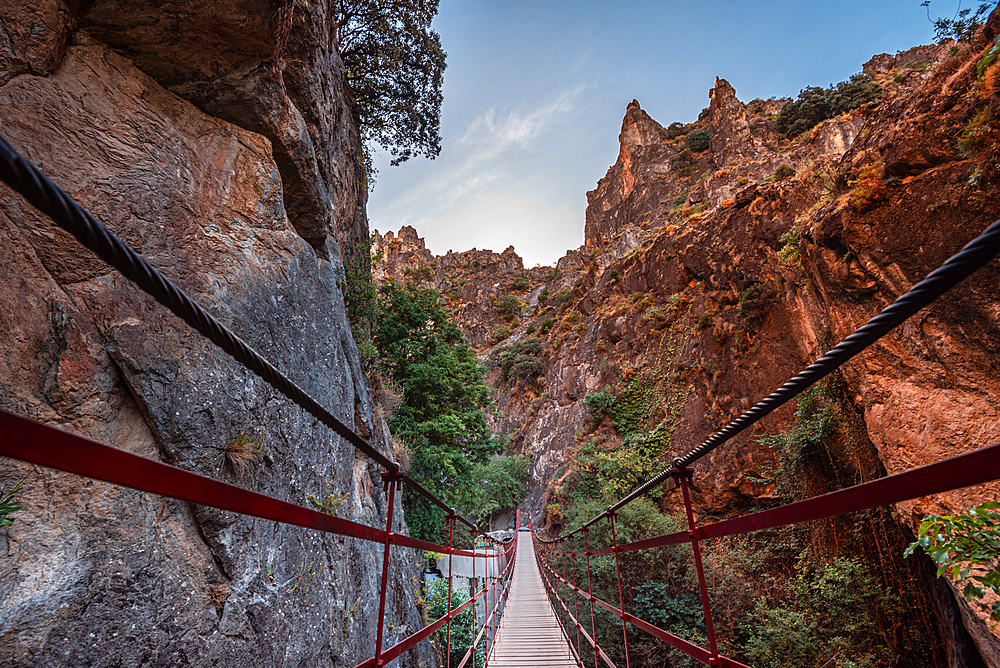 Pedestrian suspension bridge leading through the gorge of Los Cahorros Monachil, Monachil, Sierra Nevada, Granada, Andalusia, Spain, Europe