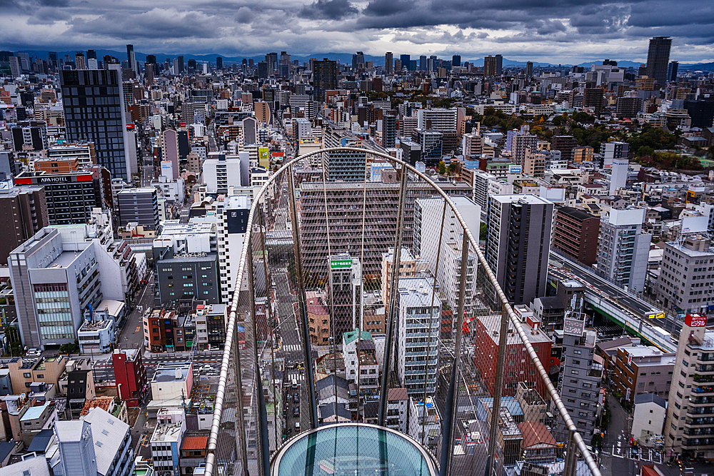 View from the Tsutenkaku Tower skywalk in the Shinsekai area, of the city skyline, Osaka, Honshu, Japan, Asia