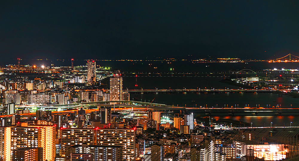 Highway and railway bridges crossing the Yodo River, night skyline, Osaka, Honshu, Japan, Asia