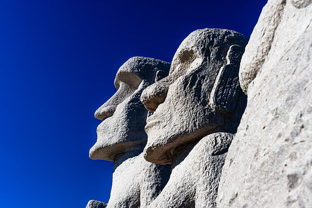 Moai statues against a blue sky, Makomanai Takino Cemetery, Hill of the Buddha, Sapporo, Hokkaido, Japan, Asia