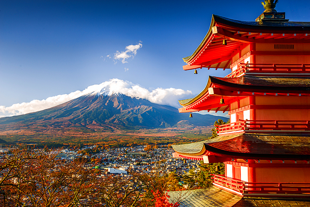 Vibrant sunrise at Five-storey pagoda, Chureito Pagoda, overlooking Fujiyoshida City and Mount Fuji volcano, Fujiyoshida, Honshu, Japan, Asia