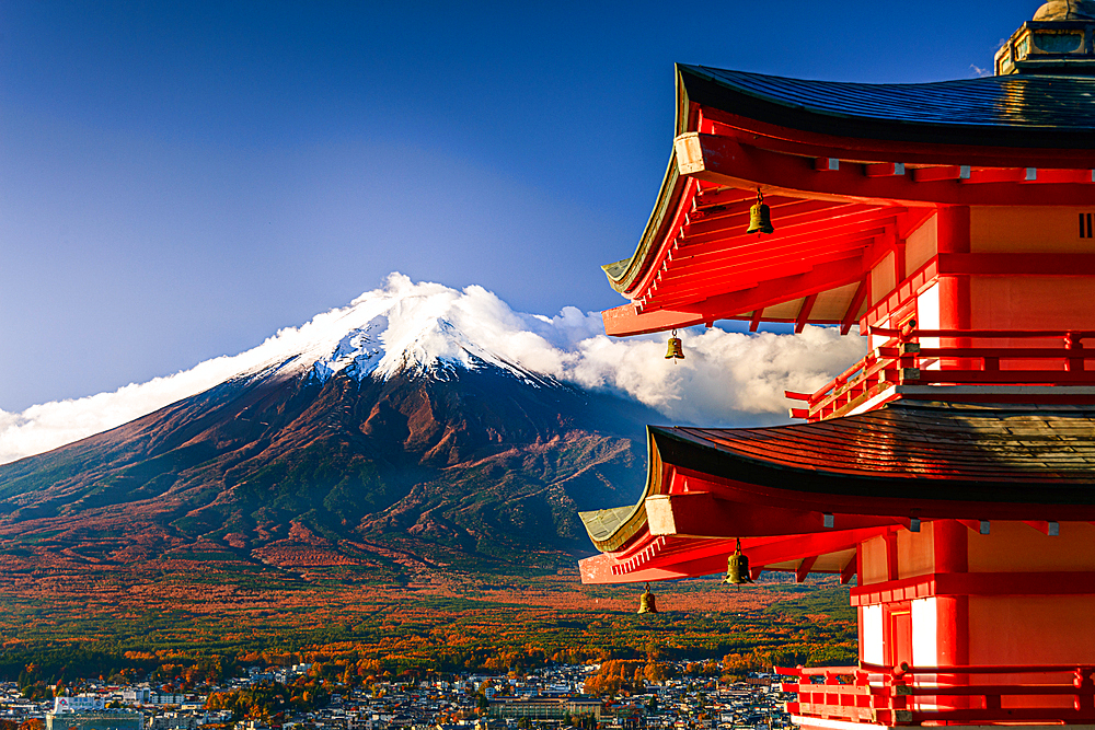 Mount Fuji, UNESCO World Heritage Site, in autumn with red Chureito Pagoda with fall leaves, Fujiyoshida, Honshu, Japan, Asia