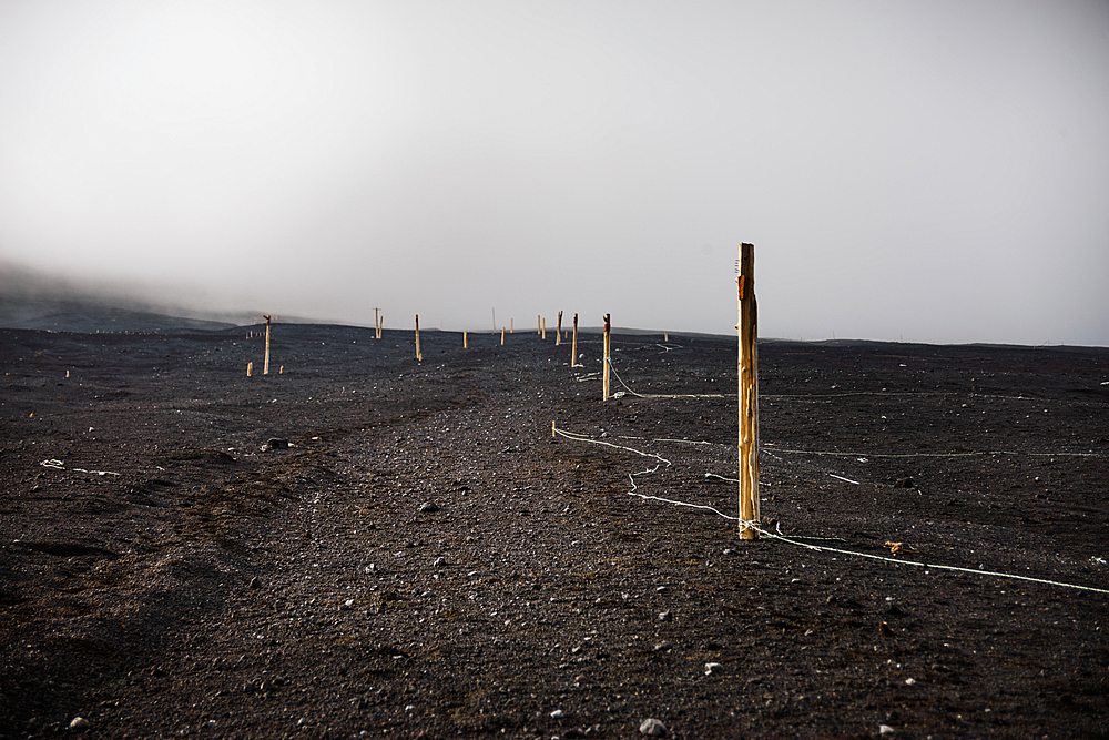 Hiking path in the ashes of Mount Fuji in a fog cloud, Honshu, Japan, Asia