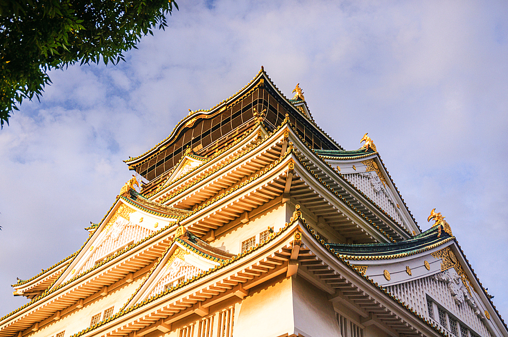 Osaka Castle illuminated at golden hour, Osaka, Honshu, Japan