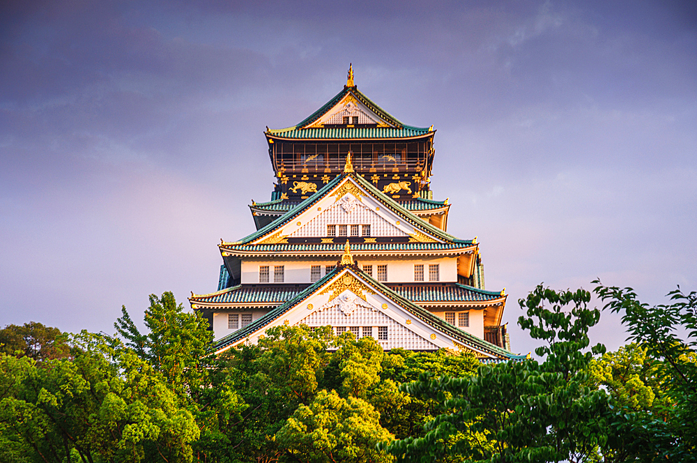 Osaka Castle illuminated at golden hour, Osaka, Honshu, Japan