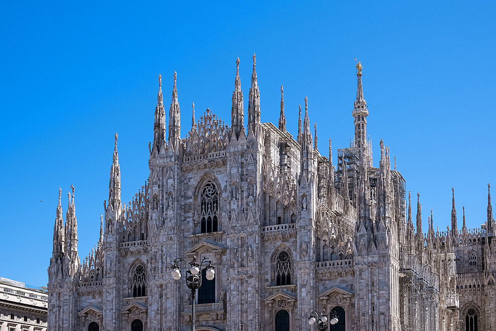 Facade of Milan Cathedral (Duomo di Milano), dedicated to the Nativity of St. Mary, seat of the Archbishop, Milan, Lombardy, Italy, Europe