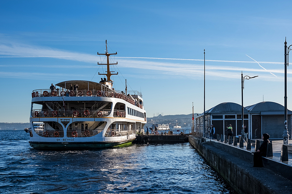 View of the Eminonu waterfront, a major dock for ferries crossing The Bosphorus, at the southern end of the Galata Bridge over the Golden Horn, Istanbul, Turkey,Europe