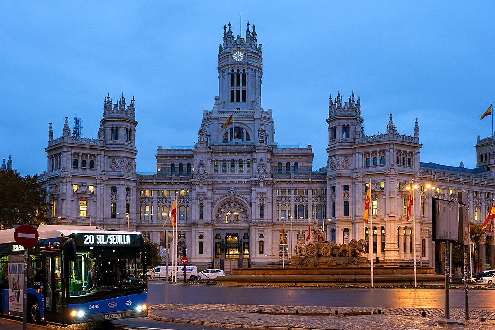 Scenic view of Plaza de Cibeles, featuring the majestic Cibeles Palace in the background and the famous Cibeles Fountain in the foreground, Madrid, Spain, Europe