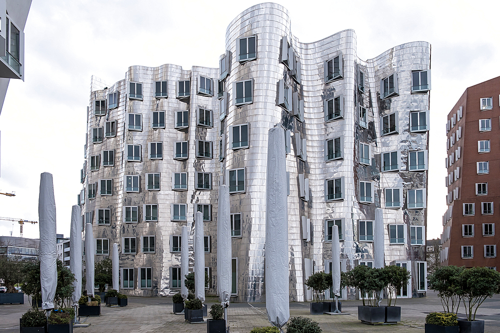 View of the Neuer Zollhof (The New Zollhof), named after a former customs facility, a building ensemble in the Medienhafen and prominent landmark of Dusseldorf-Hafen, part of the redeveloped port of Dusseldorf, Dusseldorf, North Rhine Westphalia, Germany, Europe