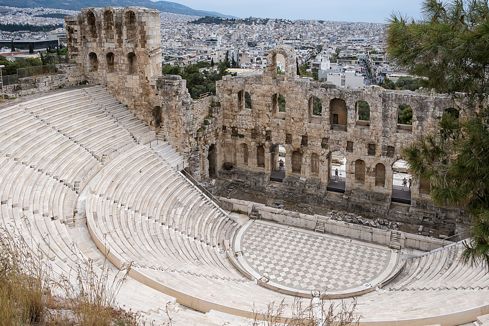 View of the Theatre of Dionysus, an ancient Greek theatre built on the south slope of the Acropolis, originally part of the sanctuary of Dionysus Eleuthereus, in Athens, Greece.