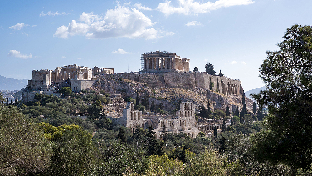 View of the Acropolis of Athens from Mouseion Hill, located to the southwest. The Acropolis, an ancient citadel perched on a rocky outcrop above the city, contains the remains of several significant ancient buildings, including the Parthenon.