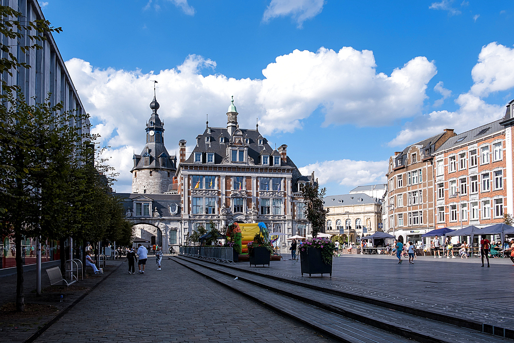 View of Place d'Armes, formerly Grand Place, a historic cobbled square in central Namur, Belgium. Known for its vibrant markets and events, it features notable landmarks including the Namur City Hall.