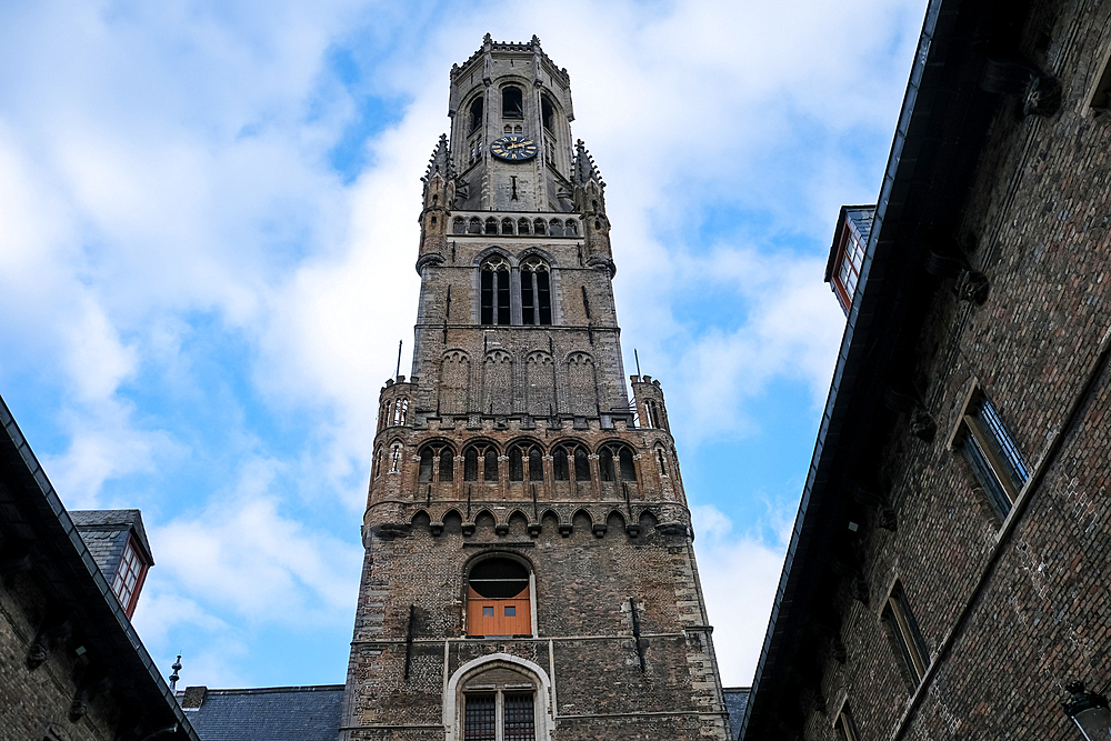 Bruges, Belgium – Architectural detail of the Belfry of Bruges, a medieval tower in the city center. A historic symbol, it once housed a treasury, municipal archives, and served as an observation post.