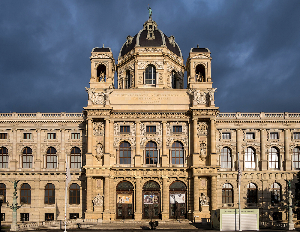 Vienna, Austria – View of the Naturhistorisches Museum entrance, its grand Renaissance Revival portal crowned by a dome and adorned with allegorical sculptures, overlooking Maria-Theresien-Platz.