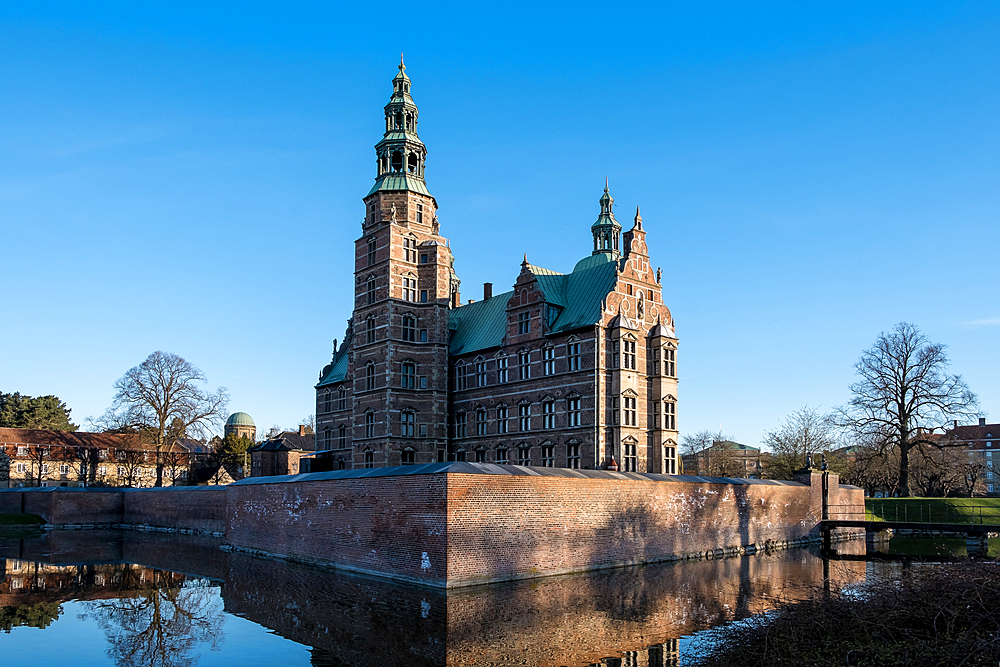 Copenhagen, Denmark – View of Rosenborg Slot, a 17th-century Renaissance castle set in Kongens Have, housing Denmark’s royal regalia and treasures in a richly decorated historical setting.