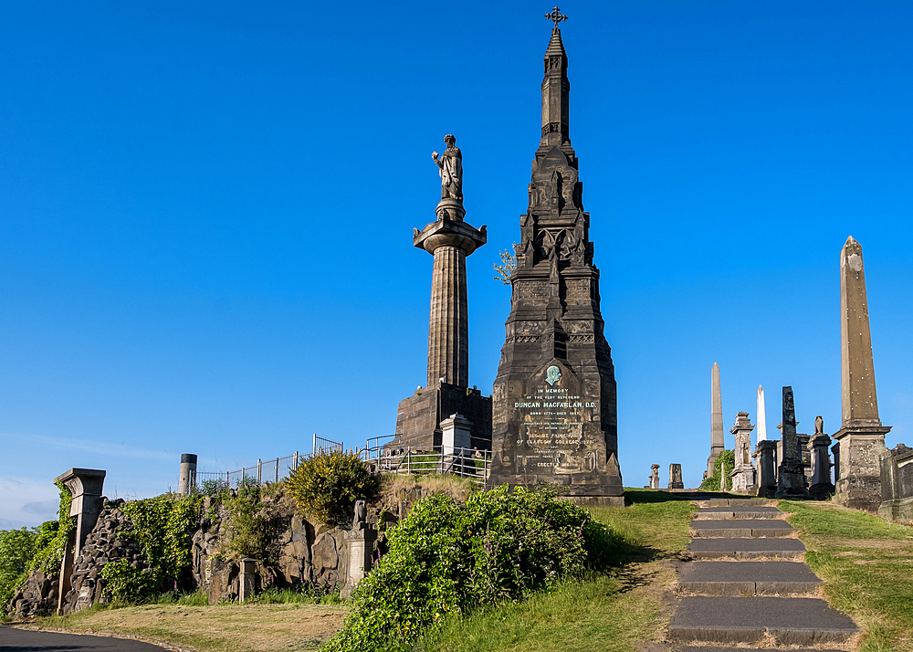 Glasgow, Scotland – Architectural detail of Glasgow Necropolis, a Victorian cemetery featuring ornate monuments, sculptures, and memorials, reflecting the city’s 19th-century heritage.