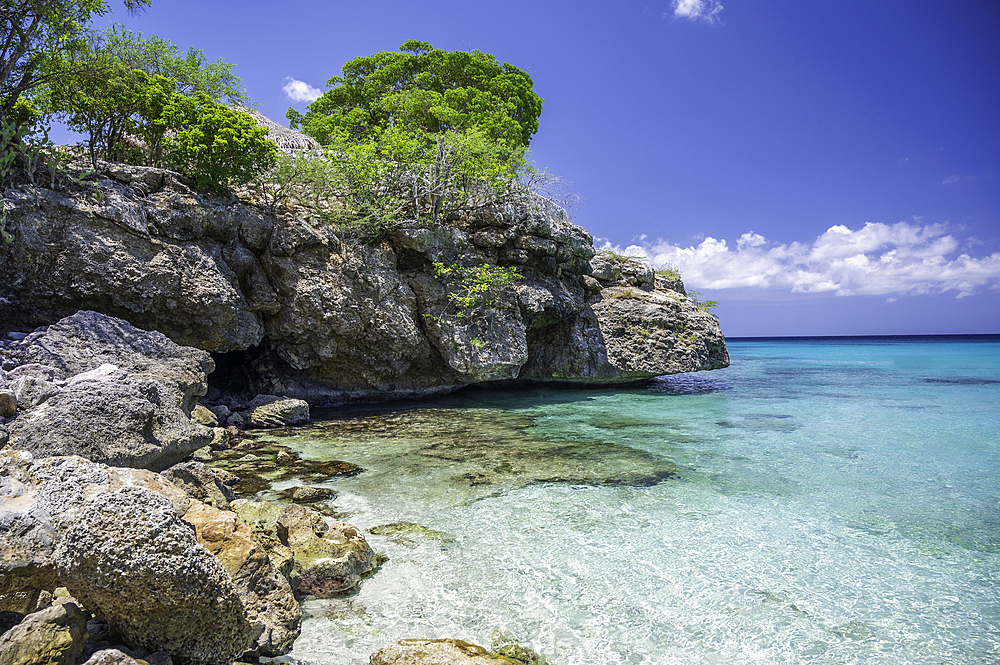 The crystal clear turquoise ocean, at Grote Knip beach, famous for its blue water, on the Dutch Caribbean island of Curacao, West Indies, Caribbean, Central America