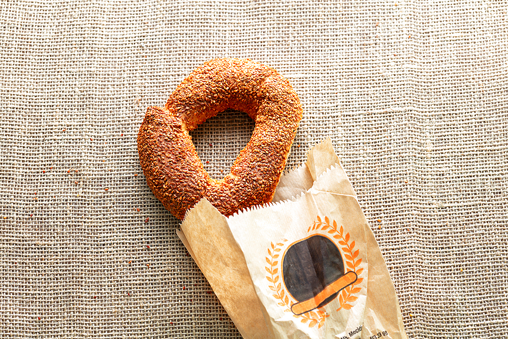 Famous Turkish simit in a paper bag (craftpackage), bagel, street food, Bursa, Turkey, Asia Minor, Eurasia