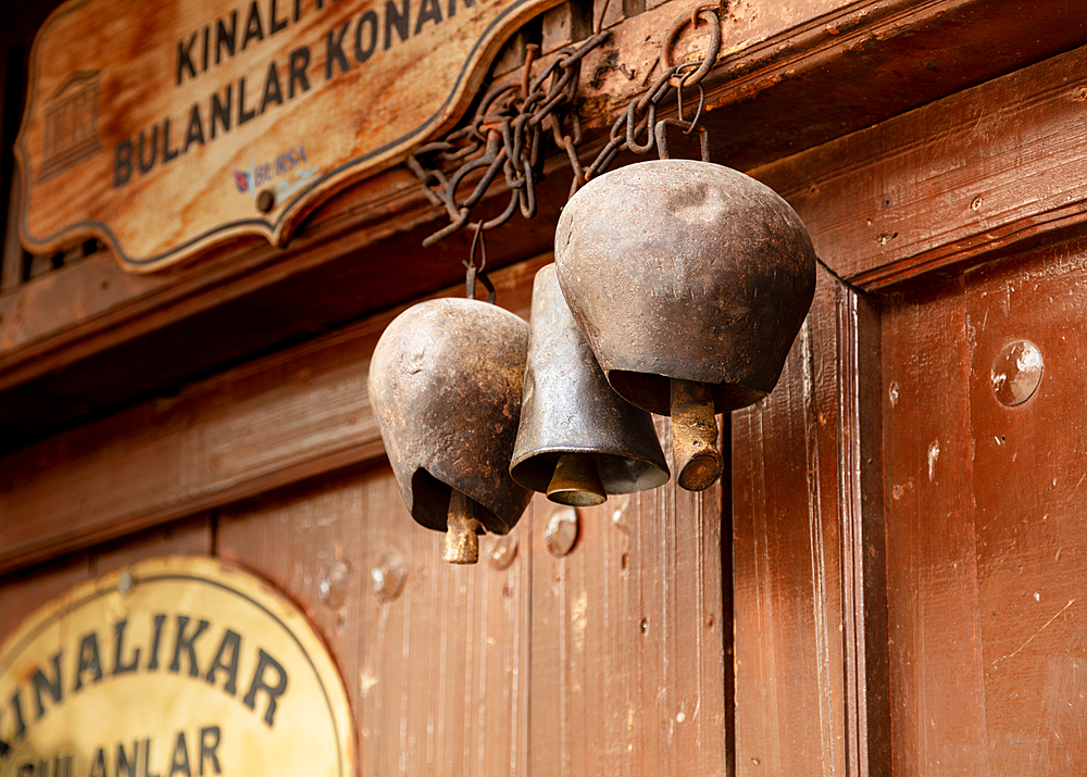 Bells for cows on the gate of a house in the village of Zhumalikizik, protected by UNESCO, Bursa, Turkey, Asia Minor, Eurasia