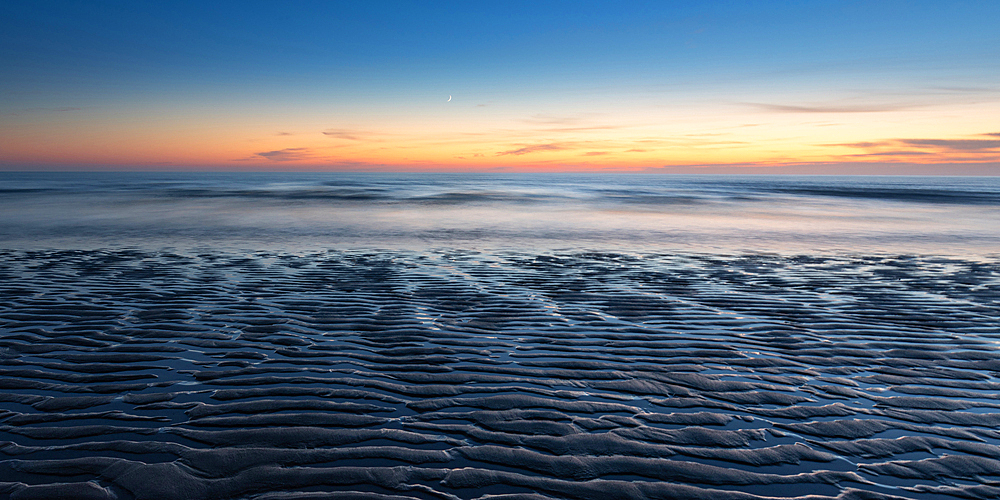 Sunset and sand ripples at Watergate Bay in Cornwall, England, United Kingdom, Europe