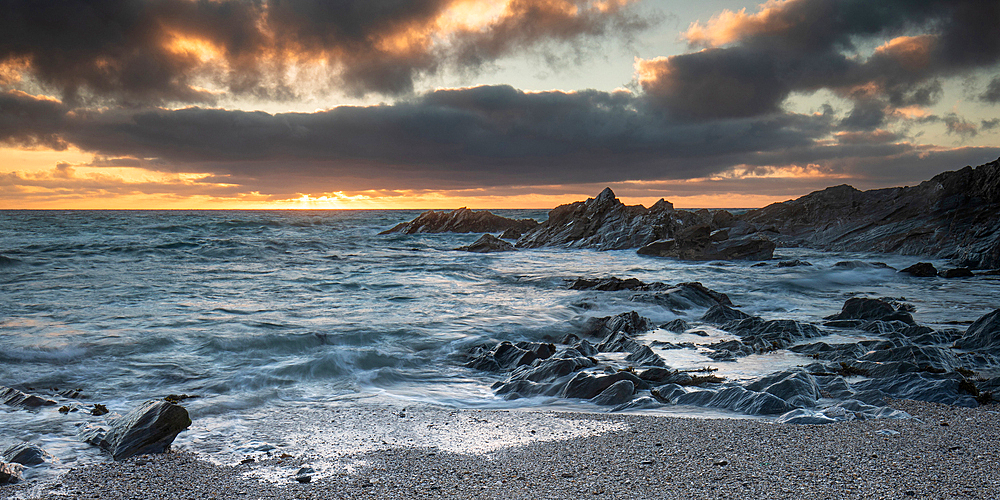 A sunset shot of Fistral Bay in Cornwall, England, United Kingdom, Europe