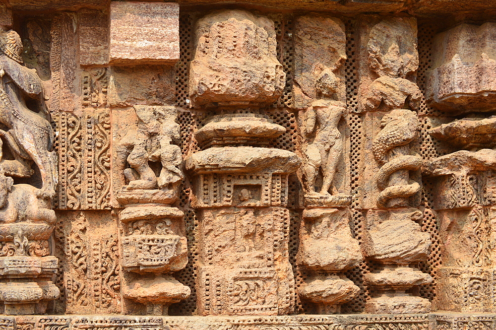 Superbly carved intricate sculptures adorn the existed Konark Sun Temple's exterior. these include deities, floral and geometric patterns, dancers.musicians, elephants, birds,mythical creatures and...lovers in erotic poses.