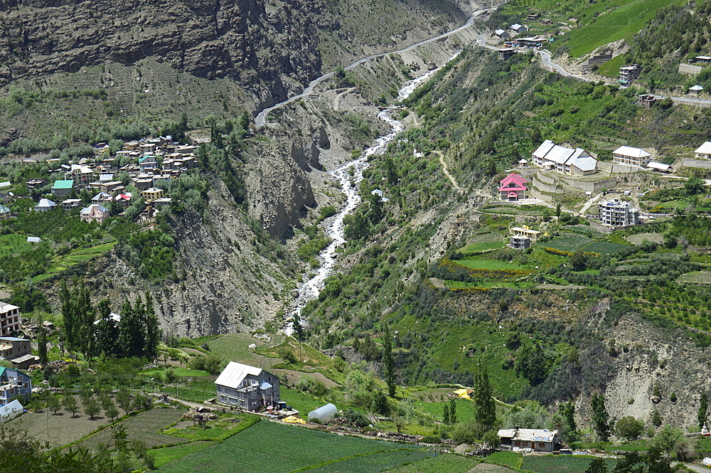 Scenic view of a village in the Lahaul Valley near Keylong on the bank of the River Chander Bhaga, Himachal Pradesh, India, Asia