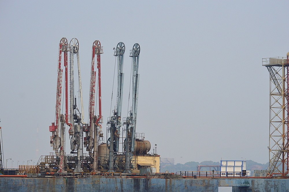 Marine loading arms also known as mechanical loading arms or MLA.at Mumbai port used to transfer fluids and liquefied gases into small or large crude carriers.