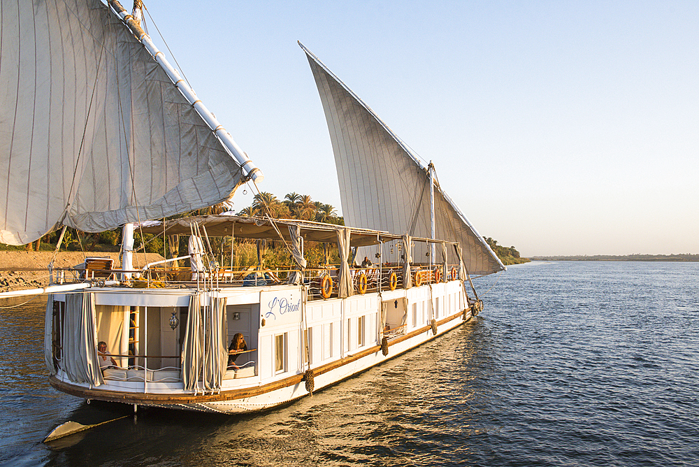 Dahabeah under sail, passenger river boat of the Lazuli fleet, sailing on the Nile river near Aswan, Egypt, North Africa, Africa