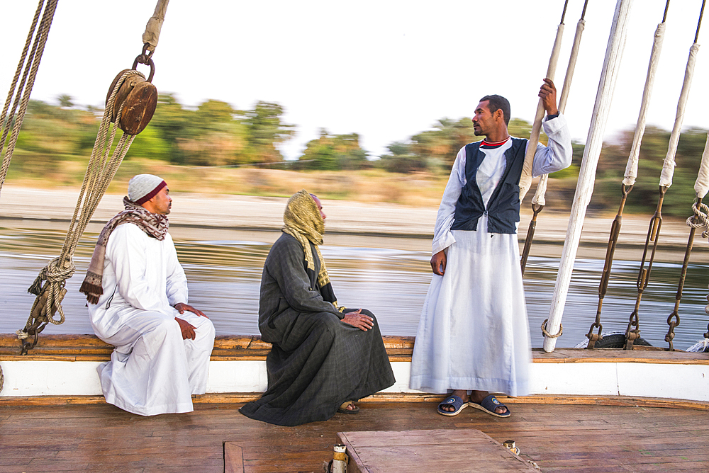 Members of the crew on board a dahabeah, passenger river boat of the Lazuli fleet, sailing on the Nile river, Egypt, North Africa, Africa