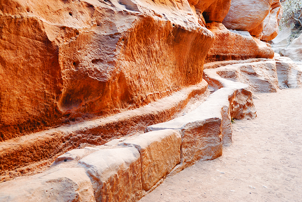 Aqueduct in al-Siq (narrow gorge) that is the main entrance to the ancient city of Petra, UNESCO World Heritage Site, Jordan, Middle East