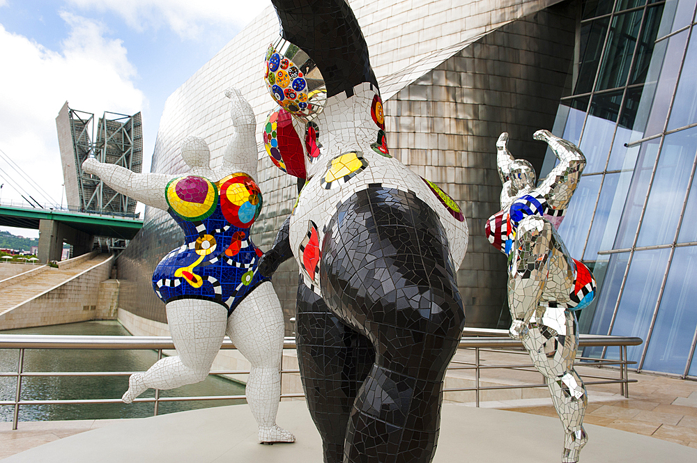 Temporary exhibition of Nanas by the French artist Niki de Saint Phalle, 1930-2002, at the Guggenheim Museum designed by architect Frank Gehry, Bilbao, province of Biscay, Basque Country, Spain, Europe