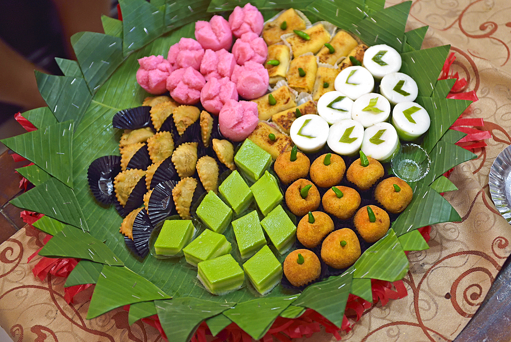 Close-up of plate of snacks, Pekalongan, Java island, Indonesia, Southeast Asia, Asia