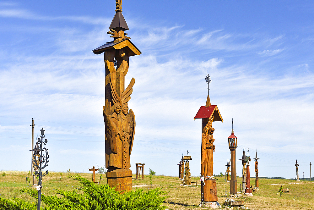 Sculptures of angels made of oak wood on the Hill of Angels, near Trakai, Lithuania, Europe