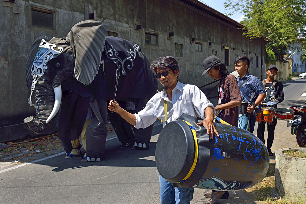 Welcoming performance of Gajah Krumpyung (fake elephant and traditional music instrument), Sondakan district, Solo (Surakarta), Java island, Indonesia, Southeast Asia, Asia