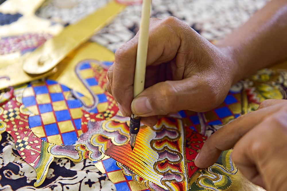 workshop of puppets for shadow play (wayang kulit), Bima Art Shadow Puppet Maker, Sondakan district, Solo (Surakarta), Java island, Indonesia, Southeast Asia