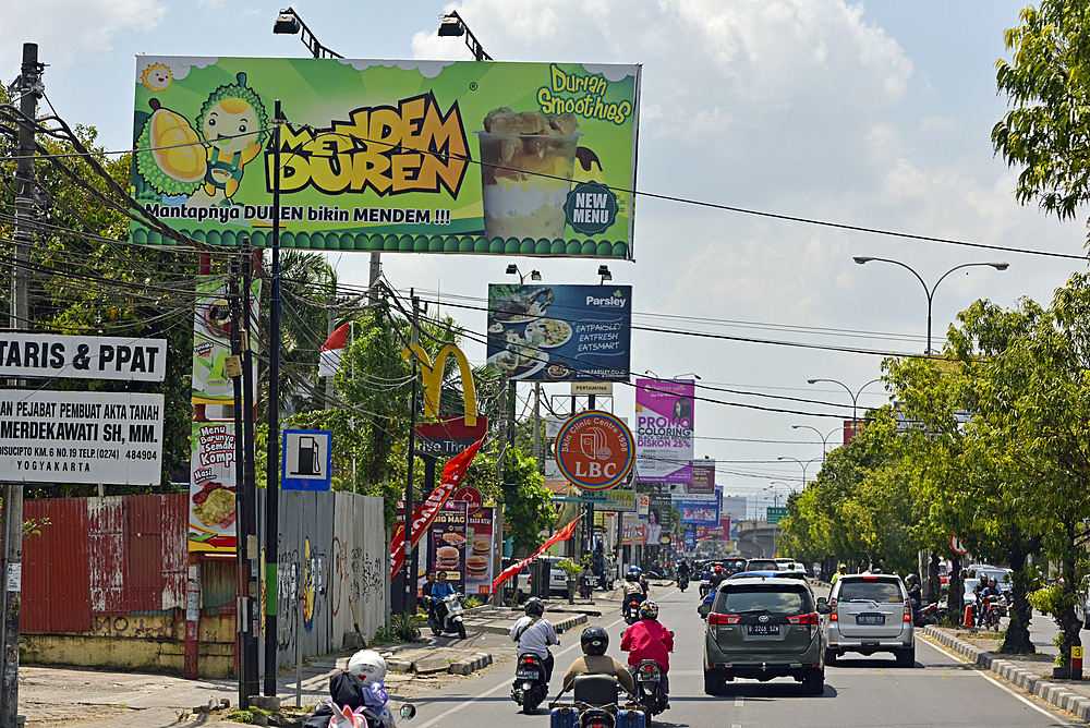 Billboards in a street of Yogyakarta, Java island, Indonesia, Southeast Asia, Asia, Asia